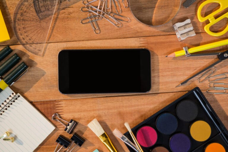 galaxy leaks close up mobile phone with various stationery